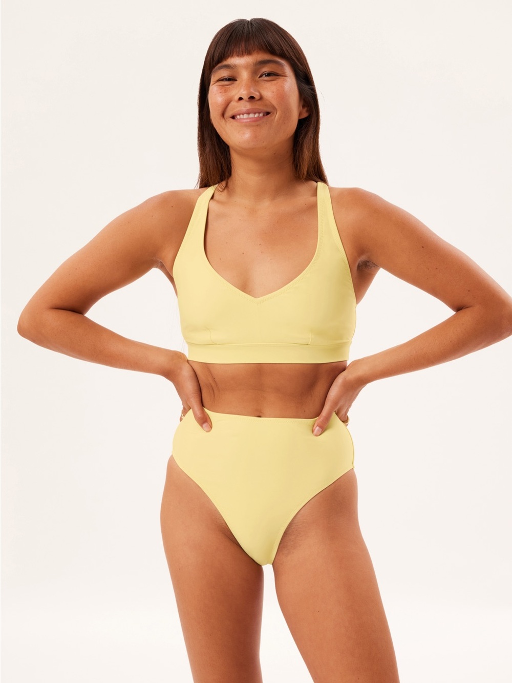 Girlfriend Collective Yellow Cross back Bikini Top and High Waisted Bottom
